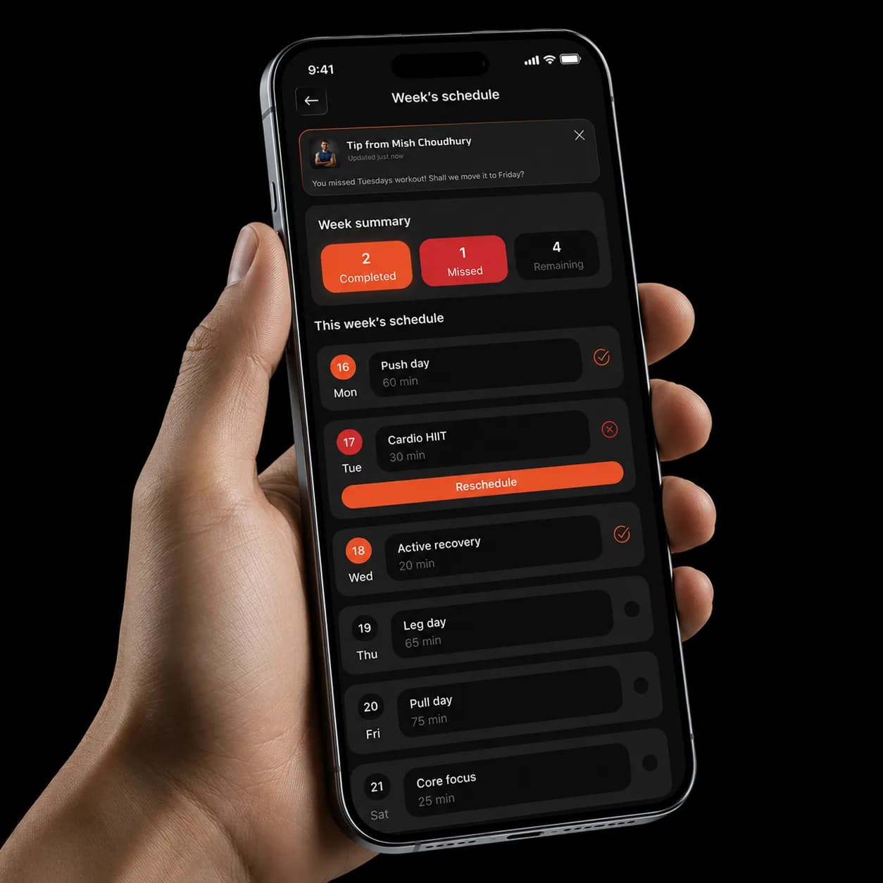 Hand holding a phone showing a personalised weekly training schedule in the Icon Training app